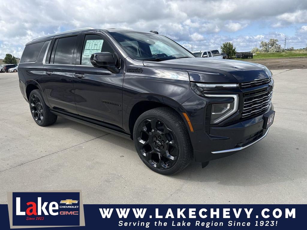 2026 Chevrolet Suburban High Country in Dark Ash Metallic — front three-quarter view